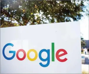  ?? JOSH EDELSON/ AFP ?? A Google sign is seen at the Googleplex in Menlo Park, California. Google said yesterday it was working to fix a search algorithm glitch that produced ‘inappropri­ate and misleading’ results from its search engine and connected speaker.