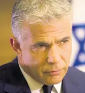  ?? AP ?? In this October 31, 2016 file photo, Israeli Knesset member Yair Lapid gives an interview in his office at the Knesset, Israel’s parliament, in Jerusalem.