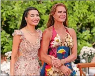  ?? ?? Miranda Cosgrove, left, and Brooke Shields in a scene from the Netflix film “Mother of the Bride.”