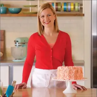  ?? SUPPLIED PHOTO ?? Anna Olson with her Peach Cake from “The Bake with Anna Olson Cookbook.”