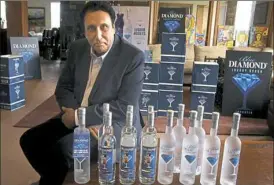  ?? Darrell Sapp/Post-Gazette ?? Mark Lucero distribute­s vodka made in Estonia under the Blue Diamond name in Pittsburgh.