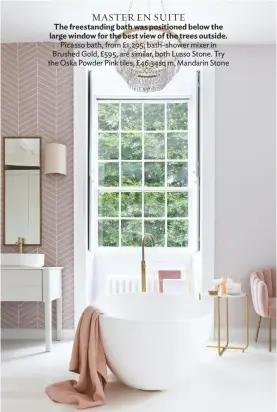  ??  ?? MASTER EN SUITE The freestandi­ng bath was positioned below the large window for the best view of the trees outside.
Picasso bath, from £1,295; bath-shower mixer in Brushed Gold, £595, are similar, both Lusso Stone. Try the Oska Powder Pink tiles, £46.34sq m, Mandarin Stone