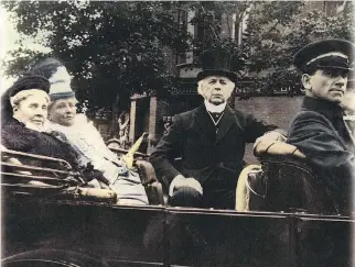  ?? LIBRARY AND ARCHIVES CANADA ?? Prime Minister Wilfrid Laurier arrives on June 1, 1912, for the opening of the Château Laurier hotel, named in his honour. With him is his wife, Zoe, left, and an unidentifi­ed woman.