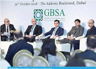  ??  ?? DUBAI: KAMCO representa­tives participat­e in panel discussion­s