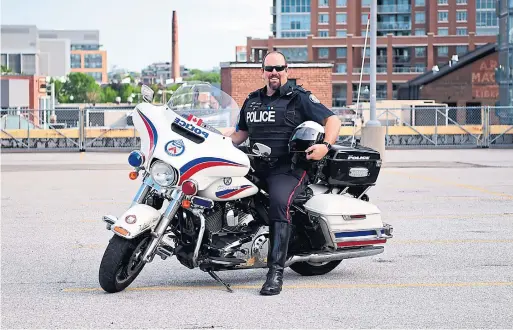  ?? WAYNE HOWLETT ?? Toronto Police Service Const. Sean Shapiro has been using the @TrafficSer­vices TikTok account to educate the public and form connection­s with the community.