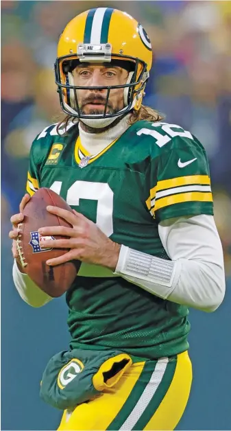  ?? JEFFREY PHELPS/AP ?? Packers quarterbac­k Aaron Rodgers tried to fool everyone into thinking he had been vaccinated.