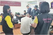  ?? CHINNAWAT SINGHA ?? A man is arrested in Phitsanulo­k for forcing his 19-yearold girlfriend into group sex and selling her videos for customers via Twitter and Line. He was a Buddhist monk when the arrest took place.