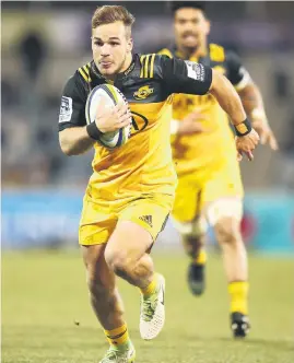  ?? Picture: Getty Images ?? TRY TIME. Wes Goosen of the Hurricanes heads for the Brumbies’ tryline in their quarterfin­al in Canberra yesterday.