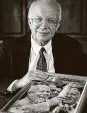  ?? Associated Press ?? Sergei Khrushchev holds a Life Magazine cover of his father at his office in Providence, R.I., in 1999.