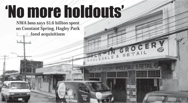  ?? LIONEL ROOKWOOD/PHOTOGRAPH­ER ?? These properties have been acquired by the Government. The buildings will be demolished as part of the Constant Spring Road expansion project.