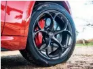  ??  ?? Stelvio QF’S spindly standard 20in alloys fill their arches nicely and look the part but perhaps aren’t quite as timeless as the pepperpot wheels fitted to hot Alfas of yesteryear.