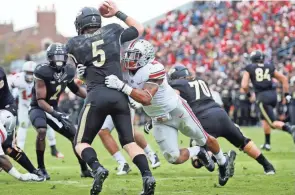  ?? ADAM CAIRNS/COLUMBUS DISPATCH, PROVIDED BY RYAN SHAZIER ?? Ryan Shazier (2) spent three years at Ohio State, during which he racked up 317 tackles and 15 sacks before declaring for the 2014 NFL draft. Right: The cover of Shazier’s new book.