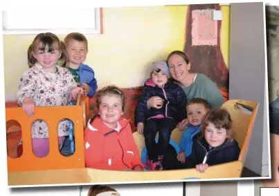  ?? Photo by Domnick Walsh ?? ABOVE: Sorcha Weadick of Tír na nÓg pre-school in Ballybunio­n with Aine, Tim, Emilia, Roselyn, Aislinn, and Donnacha. RIGHT: The new reality of hair care as demonstrat­ed by stylist Eilish Casey on happy client Mairead McNamara in Rose’s Hair Salon in Ballybunio­n. Photos by Marie Rohan BELOW: Normán Ó Conchúir putting the finishing touches to a deep clean of the popular premises he runs in Dingle, Bob Griffin’s Bar, as the industry prepares to begin reopening.