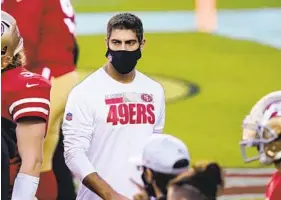  ?? TONY AVELAR AP ?? San Francisco quarterbac­k Jimmy Garoppolo has missed the last two games with a high ankle sprain. Coach Kyle Shanahan said Garoppolo will start this weekend.