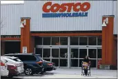  ?? THE ASSOCIATED PRESS ?? Costco stores have dropped the sales of Chaokoh coconut milk from the Theppadung­porn Coconut Co. for its use of forced monkey labor in Thailand.