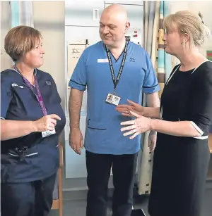  ?? Picture: PA. ?? Health Secretary Shona Robison chats with head of nursing Brendan Forman and senior charge nurse Diane Gardiner at Perth Royal Infirmary.