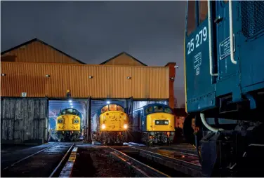  ?? Tom Mcatee ?? A photograph­ic charter on the East Lancashire Railway on February 9 saw Baron Street Locomotive Works used to recreate North West 1980s depot scenes. The Br-blue line-up of Class 40 Preservati­on Society’s 40135, the Class 40 Appeal’s 40012 Aureol and the Peak Locomotive Company’s 45108 are displayed, with privately-owned 25279 in the foreground.