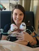  ?? Courtesy photo ?? Katie Snyder Evans holds her newborn twins at the hospital. Evans was killed in a car crash, authoritie­s believe the driver of the other vehicle, Alexia Alilah Cina, was driving intoxicate­d. Cina appeared in court on Wednesday to set a date for a...