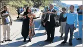  ??  ?? A CUT ABOVE: Roads and Public Works MEC Thandiswa Marawu officialy opens a road at Port St Johns recently Upgrading of Ugie Location: Phase 2: