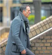  ??  ?? Acquitted: Former Tesco executive Christophe­r Bush arrives at Southwark crown court in London on Thursday.