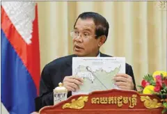  ?? FACEBOOK ?? Prime Minister Hun Sen speaks to the press following a meeting on Friday with his Laotian counterpar­t, Thongloun Sisoulith, on border demarcatio­n at the Peace Palace in Phnom Penh.