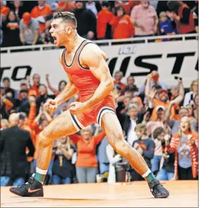  ?? [NATE BILLINGS/ THE OKLAHOMAN] ?? Oklahoma State's Nick Piccininni celebrates after one of his 102 career wrestling victories as a Cowboy.