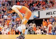 ?? [PHOTO BY SARAH PHIPPS, THE OKLAHOMAN] ?? Oklahoma State’s Anthony Collica reacts after losing to Penn State’s Zain Retherford in the 149-pound match during the NWCA Dual Championsh­ip on Sunday in Gallagher-Iba Arena. No. 2-ranked Penn State beat the No. 1 Cowboys, 27-13.