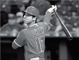  ?? ASSOCIATED PRESS ?? LOS ANGELES ANGELS’ SHOHEI OHTANI HITS a double during the second inning of Friday’s game against the Kansas City Royals in Kansas City, Mo.