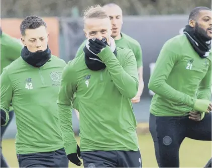  ??  ?? 2 Striker Leigh Griffiths has been in a much more jovial mood now that he’s back in contention for a return to the first team following a frustratin­g two months out with calf and hamstring injuries.