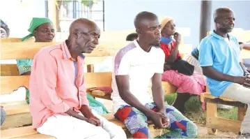  ?? ?? Samuel Mawocha and his family at Acting Chief Mutambara's community court recently