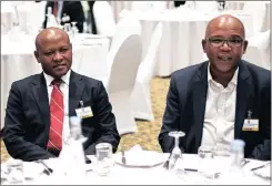  ??  ?? TALKING BUSINESS: Jeff Nemeth, Abram Masango and Silas Zimu were among guests at the luncheon. The session was attended by ministers, business leaders and leaders from organised labour.