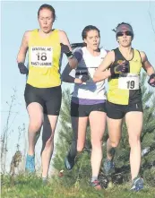  ??  ?? Tough terrain Jennifer Wetton (left) was second in the senior women’s race which helped Central clinch the league title