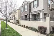  ?? Scott Lorenzo ?? Many of the new homes within Westpark have patios facing the street because many of the homes have back-loading garages.