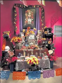  ?? Longmont Museum / Courtesy photo ?? An altar at the Longmont Museum is part of the Dia de los Muertos exhibit that will run through Jan. 9.