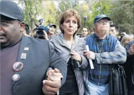  ?? Paul Sakuma Associated Press ?? LINDA KATEHI after speaking at a 2011 rally. She will be paid $318,200 on a nine-month contract; as chancellor, she received a 12-month salary of $424,360.