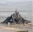  ?? Foto: dpa ?? Im Wattenmeer der Normandie felsige Insel Mont Saint Michel.liegtdie