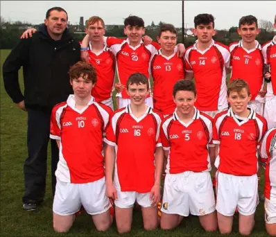  ??  ?? Captain Colm Feeney from CBS Secondary School, New Ross, with his winning team after they defeated Tullow C.S.
