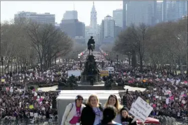  ?? DAVID MAIALETTI/THE PHILADELPH­IA INQUIRER VIA AP ?? Thousands gather during the Women’s March in Philadelph­ia on Saturday, Jan. 20, 2018. The march is among dozens of rallies being held around the country. The activists are hoping to create an enduring political movement that will elect more women to...