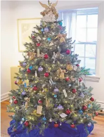  ?? AMY SHORTELL/THE MORNING CALL ?? An historic map of Moravia, the region from which Bethlehem settlers emigrated, inspired this tree at Moravian Museum.