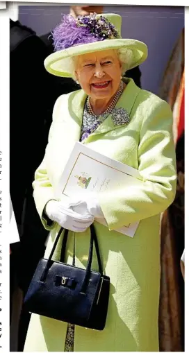  ?? Photo: Alastair Grant/AP ?? HAPPY MONARCH: Britain's Queen Elizabeth smiles after the wedding ceremony of Prince Harry and Meghan Markle.