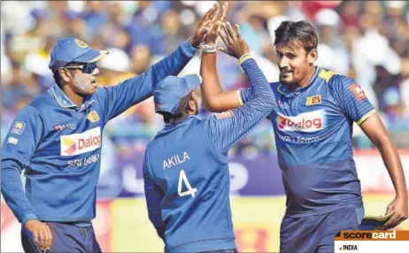  ?? PTI ?? ▪ Sri Lanka's Suranga Lakmal (R) took a fourwicket haul in a tenover spell to dismiss India for 112 at Dharamsala on Sunday.