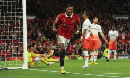  ?? Photograph: Matthew Ashton/AMA/Getty Images ?? Marcus Rashford celebrates after scoring against West Ham. Southgate said the Manchester Unitedforw­ard has ‘the joy of playing back in his face’.