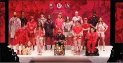  ?? THE CANADIAN PRESS CHRIS YOUNG ?? Athletes show the collection during the unveiling of the Team Canada Lululemon Athlete Kit for the Paris 2024 Olympic and Paralympic Games in Toronto on Tuesday.