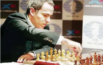  ?? PIC
REUTERS ?? Former world chess champion Garry Kasparov making his move against chess supercompu­ter Deep Junior in New York in 2003.