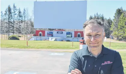  ?? DAVE STEWART/THE GUARDIAN ?? Bob Boyle, owner of the Brackley Drive-In, is hard at work getting ready for opening night on Friday.