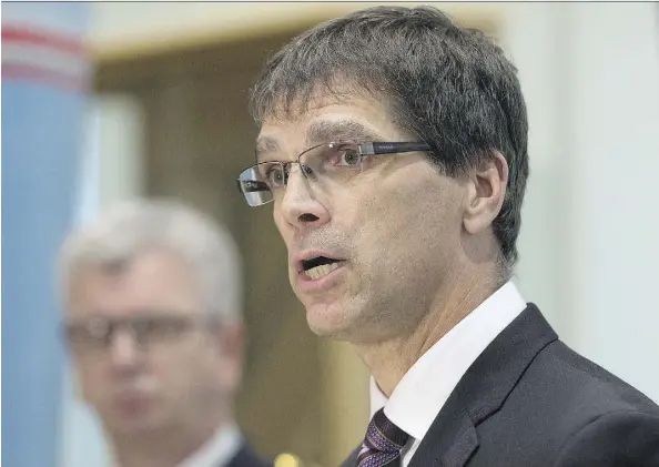  ?? GREG SOUTHAM ?? Eric Tolppanen, assistant deputy minister for the Alberta Crown Prosecutio­n Service, discusses the charge that has been laid in connection with the 2014 death of Serenity, a four-year-old girl who spent her final days in a hospital on life support after suffering catastroph­ic head injuries.