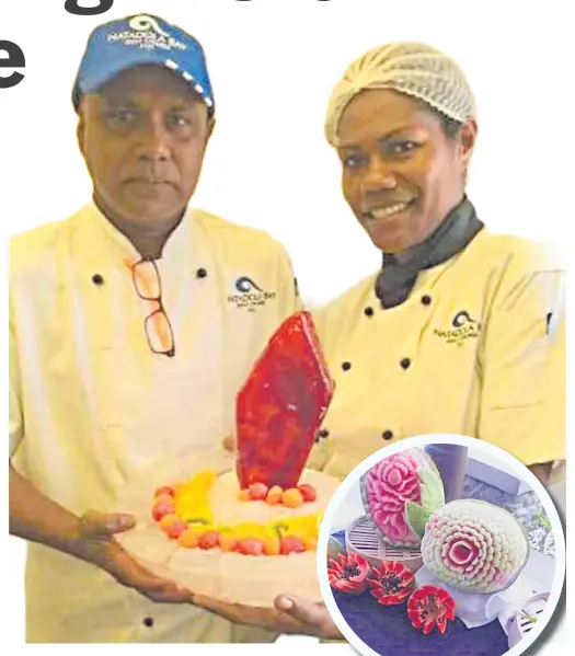  ?? Picture: SUPPLIED ?? Sous chef Sunil Dutt with a colleague. Inset: Mr Dutt’s food carving on display.