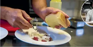  ?? PHOTOS: ANDY MACDONALD/STUFF ?? Shaved Parmigiano Reggiano on top adds a subtle flavour to battuta al coltello.