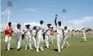  ?? Photograph: Michael Bradley/AFP/ ?? Ebadot Hossain leaves the field with the ball after taking six wickets for 46 runs.