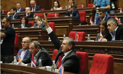  ?? Photograph: Hayk Baghdasary­an/AP ?? Armenian lawmakers voting to join the ICC in October 2023. Yerevan believes Moscow has failed to restrain Azerbaijan in the disputed Nagorno-Karabakh region.